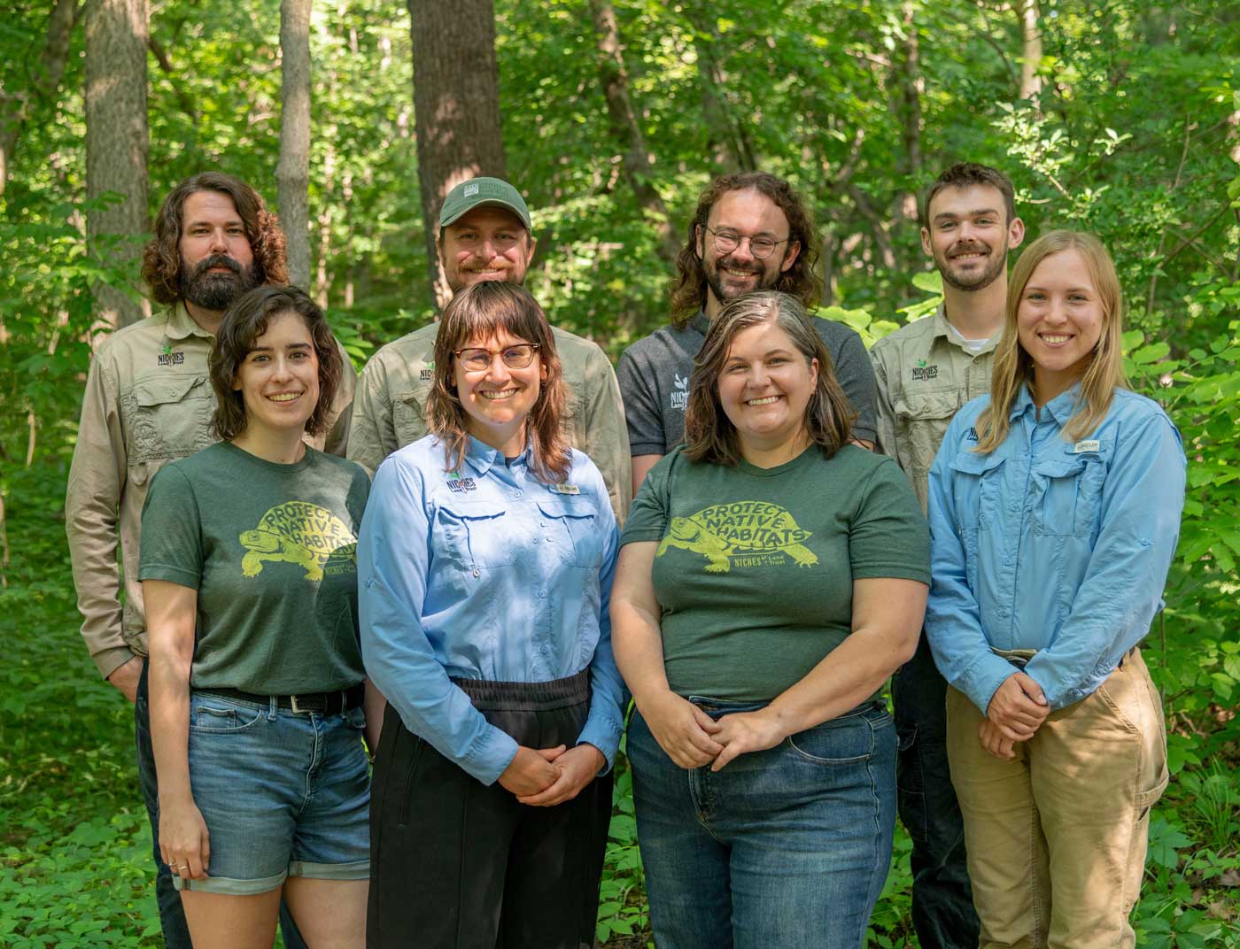 Group shot of eight staff members.