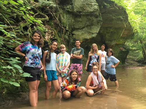 group of kids in the water at crow's grove